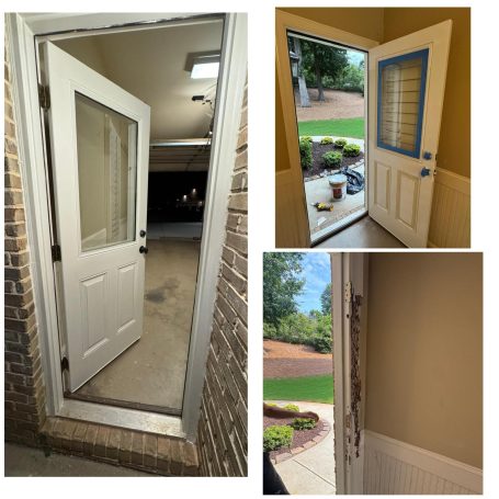 White door partially open, showing a view of an outdoor area with greenery.