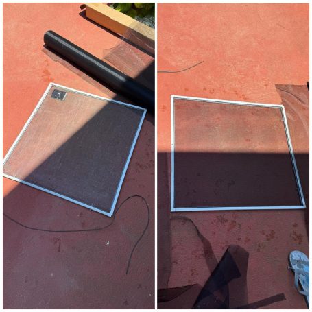 Two square window screens on a red surface, one with a corner piece and the other plain.